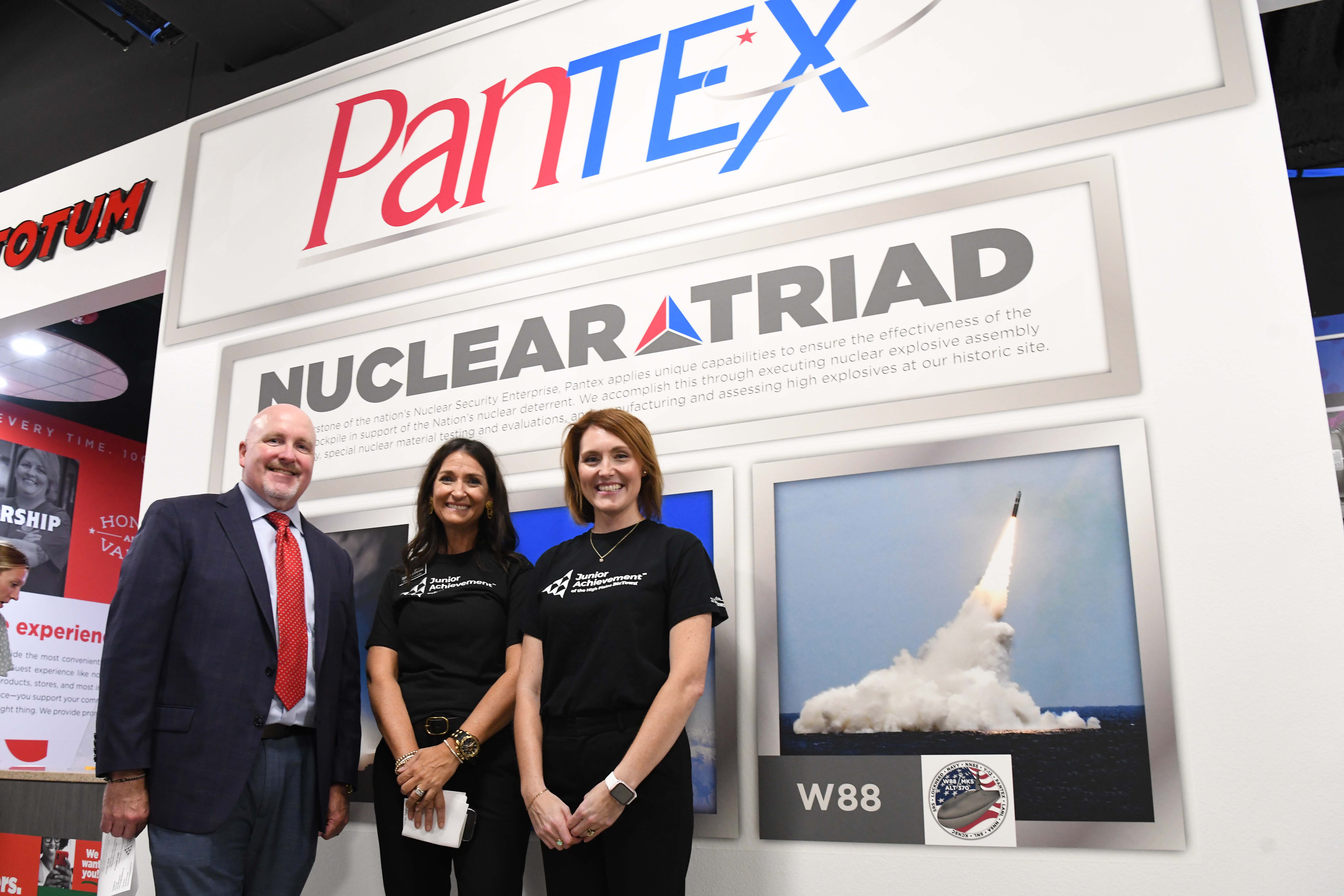 Pantex deputy site manager Kenny Steward with leaders from Junior Achievement of the High Plains