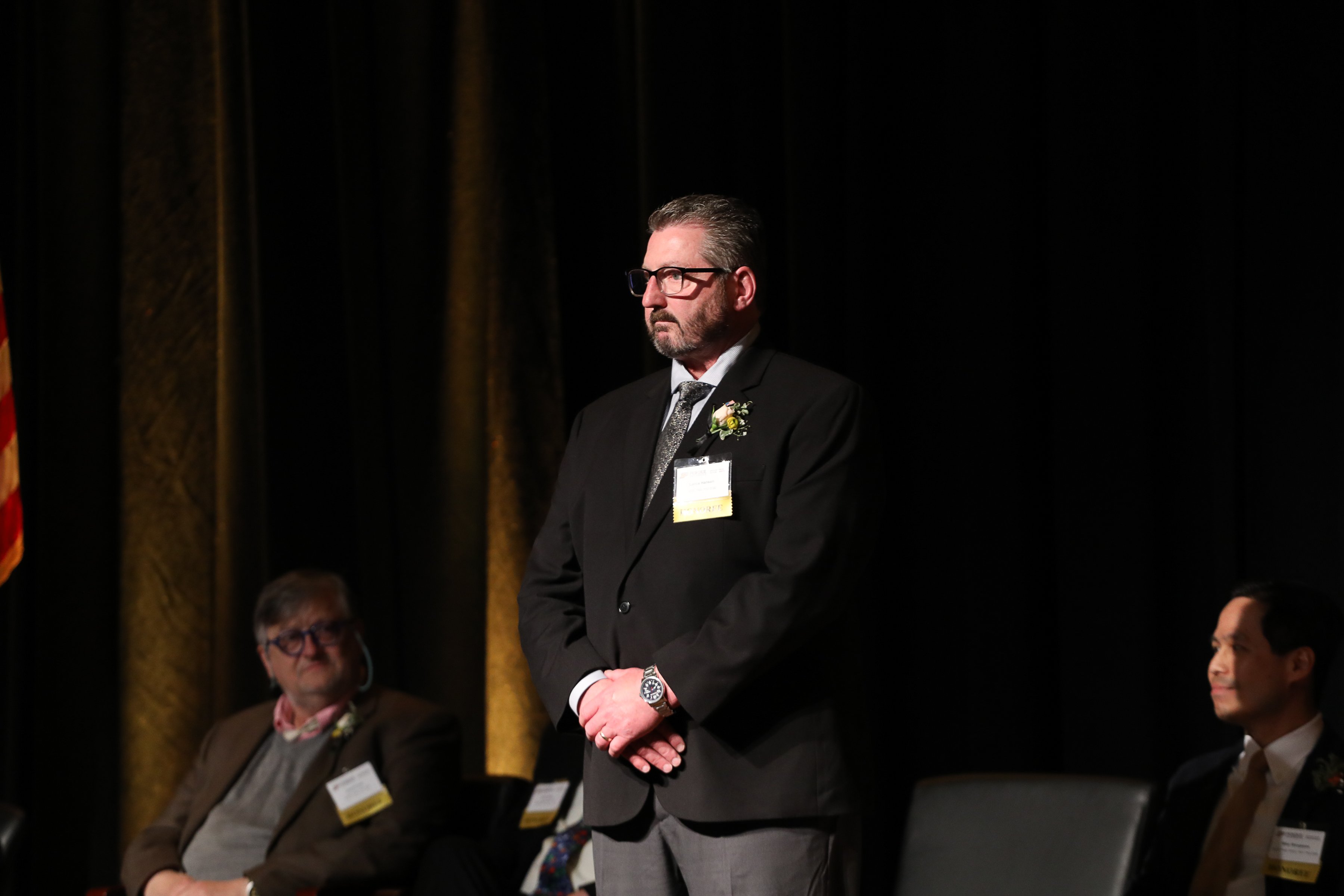 Lance Hansen is honored on stage during the Purdue Distinguished Alumni Awards. Lance Hansen is honored on stage during the Purdue Distinguished Alumni Awards.