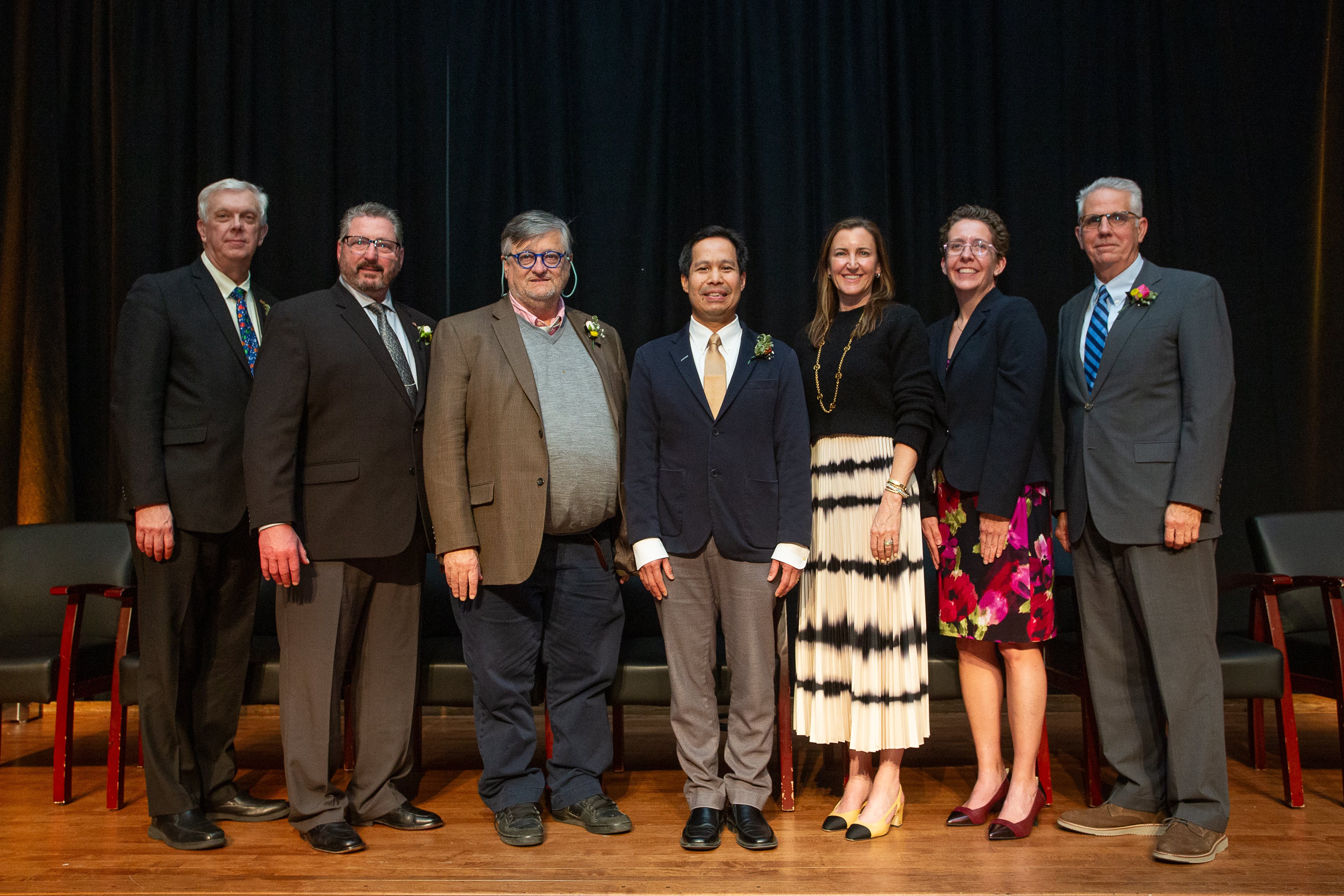 Hansen (second from the left) standing with other Purdue Alumni Achievement Award Honorees. Hansen (second from the left) standing with other Purdue Alumni Achievement Award Honorees.
