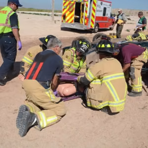 Pantex Fire Department emergency response personnel work to extract a training mannequin 