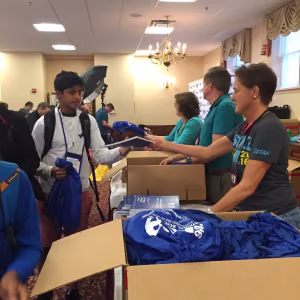 Darla Fish greets an Ascension Academy student