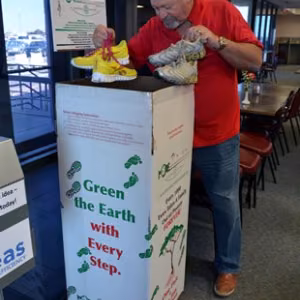 Donating used athletic shoes to the MORE Foundation Group
