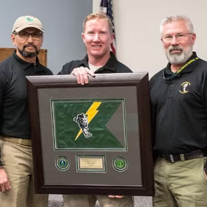 Billy Hall (center) receives the Colonel Sydnor Award from Ben Bitonel (left) and Kerry Wisniewski