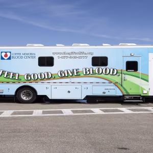 The Coffee Memorial Blood Center mobile donation bus parked at the JCDC. Photo by Adam Baker.