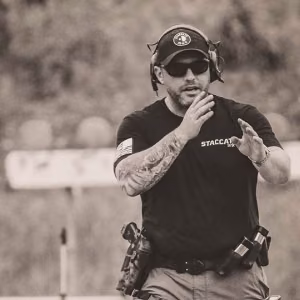 Jordan Gladman leads firearms training during a live-range exercise.